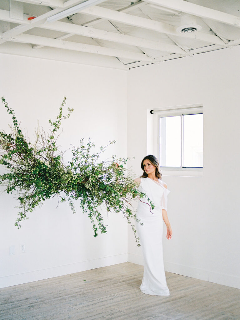 A spirea hanging installation by Gather Floral